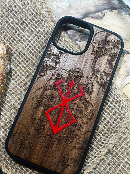 a wooden phone case with a red design on it