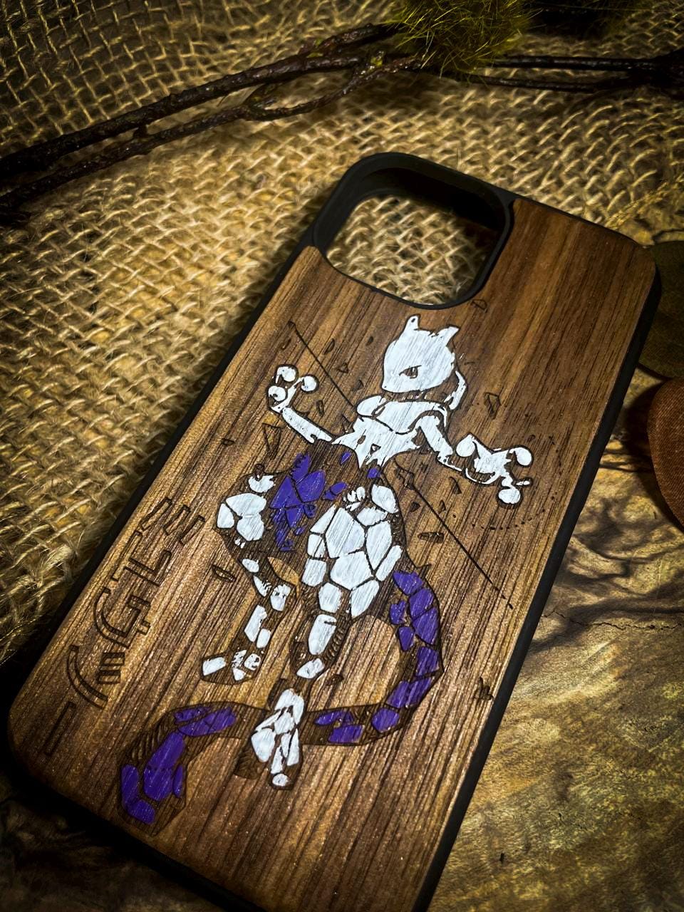 a wooden phone case with a picture of a cartoon character on it