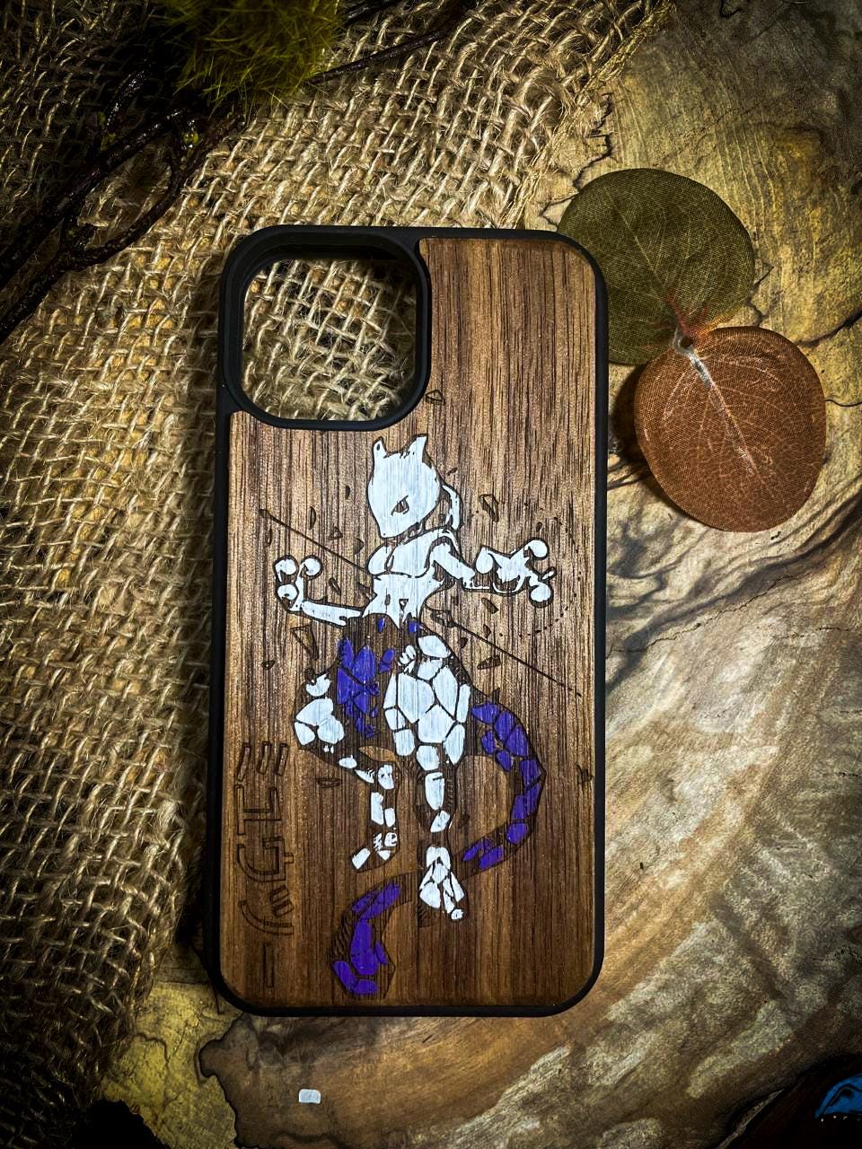 a wooden phone case with a cartoon character on it